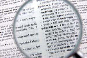 A magnifying glass shows the word Search.